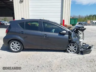 2015 Toyota Prius c One with VIN JTDKDTB31F1096438, listed as a IAAI auction lot 41859685 with 208,302 mi miles. Bid and sale history available at carsss.com. Image 13.