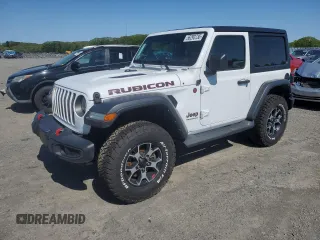 2021 Jeep Wrangler Rubicon with VIN 1C4HJXCG2MW660738, listed as a Copart auction lot 56293735 with 89,681 mi miles and Salvage title. Bid and sale history available at DreamBid. Image 1.