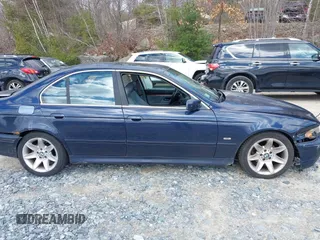 2003 BMW 5 Series 525iA with VIN WBADT43403G028405, listed as a IAAI auction lot 41850292 with 145,752 mi miles. Bid and sale history available at carsss.com. Image 13.