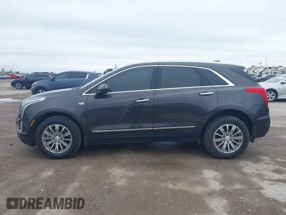 2017 Cadillac XT5 Luxury AWD z VIN 1GYKNDRS9HZ184992, wystawiony jako IAAI lot #41958484 z przebiegiem 124 941 mil mil oraz . Historia ofert i sprzedaży dostępna na DreamBid. Obrazek 14.