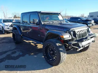 2020 Jeep Gladiator Rubicon with VIN 1C6JJTBG5LL179188, listed as a IAAI auction lot 41316367 with 136,670 mi miles and . Bid and sale history available at DreamBid. Image 1.