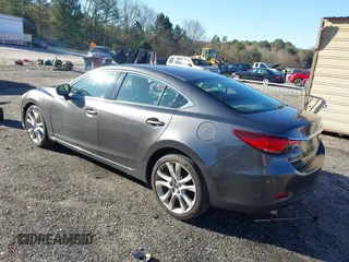 2017 Mazda 6 Touring with VIN JM1GL1V54H1130336, listed as a IAAI auction lot 41586397 with 114,076 mi miles and . Bid and sale history available at DreamBid. Image 3.