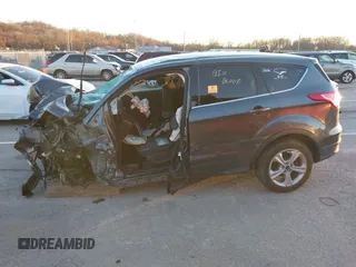 2016 Ford Escape SE with VIN 1FMCU9GX5GUB76100, listed as a IAAI auction lot 41079009 with 1 mi miles. Bid and sale history available at carsss.com. Image 14.