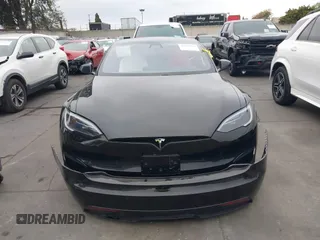 2022 Tesla Model S with VIN 5YJSA1E55NF474342, listed as a IAAI auction lot 41870994 with 33,804 mi miles and . Bid and sale history available at DreamBid. Image 13.