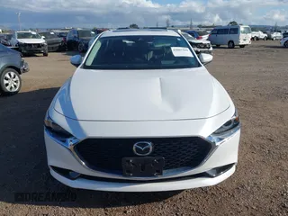 2020 Mazda 3 Premium with VIN 3MZBPAEM3LM132772, listed as a IAAI auction lot 42067269 with 53,751 mi miles and . Bid and sale history available at DreamBid. Image 12.