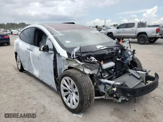 2019 Tesla Model X 75D with VIN 5YJXCAE21KF160589, listed as a Copart auction lot 54390202 with 30,860 mi miles. Bid and sale history available at carsss.com. Image 1.