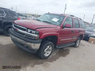 2004 Chevrolet Tahoe LT with VIN 1GNEC13Z34J203100, listed as a IAAI auction lot 41749196 with 188,416 mi miles. Bid and sale history available at carsss.com. Image 2.