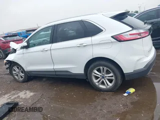 2019 Ford Edge SEL with VIN 2FMPK3J96KBB90620, listed as a IAAI auction lot 42119411 with 78,742 mi miles and . Bid and sale history available at DreamBid. Image 14.