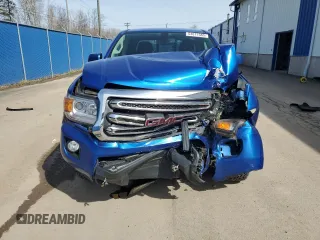 2018 GMC Canyon 4WD SLE z VIN 1GTG6CEN0J1262745, wystawiony jako Copart lot #54671585 z przebiegiem Nie podano mil oraz Szkoda całkowita • Salvage title. Historia ofert i sprzedaży dostępna na DreamBid. Obrazek 5.