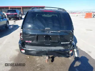 2004 GMC Envoy SLE z VIN 1GKDT13SX42416096, wystawiony jako IAAI lot #41695510 z przebiegiem 240 658 mil mil oraz . Historia ofert i sprzedaży dostępna na DreamBid. Obrazek 16.