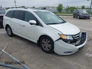 2014 Honda Odyssey EX-L with VIN 5FNRL5H67EB057714, listed as a IAAI auction lot 42335440 with 235,674 mi miles and . Bid and sale history available at DreamBid. Image 1.