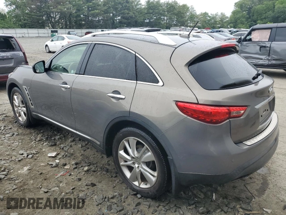 2014 Infiniti QX70 with VIN JN8CS1MW7EM412867, listed as a Copart auction lot 60054195 with 148,064 mi miles and Salvage title. Bid and sale history available at DreamBid. Image 2.