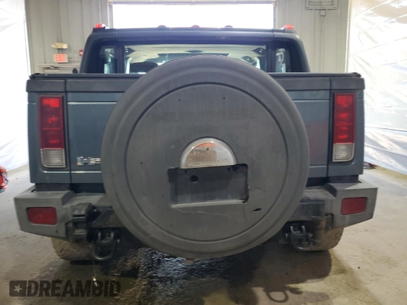 2006 Hummer H2 z VIN 5GRGN22U46H109632, wystawiony jako Copart lot #58478605 z przebiegiem 180 047 mil mil oraz Szkody całkowita. Historia ofert i sprzedaży dostępna na DreamBid. Obrazek 6.