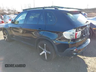 2008 BMW X5 3.0si with VIN 5UXFE43578L036366, listed as a IAAI auction lot 41181561 with 999,999 mi miles. Bid and sale history available at carsss.com. Image 3.