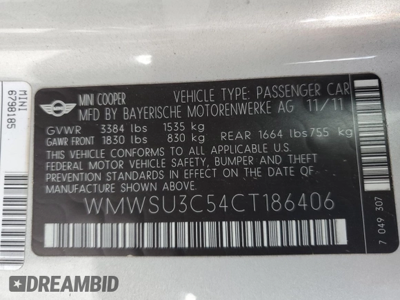 2012 MINI Hardtop with VIN WMWSU3C54CT186406, listed as a Copart auction lot 60940305 with 106,819 mi miles and Salvage title. Bid and sale history available at DreamBid. Image 14.