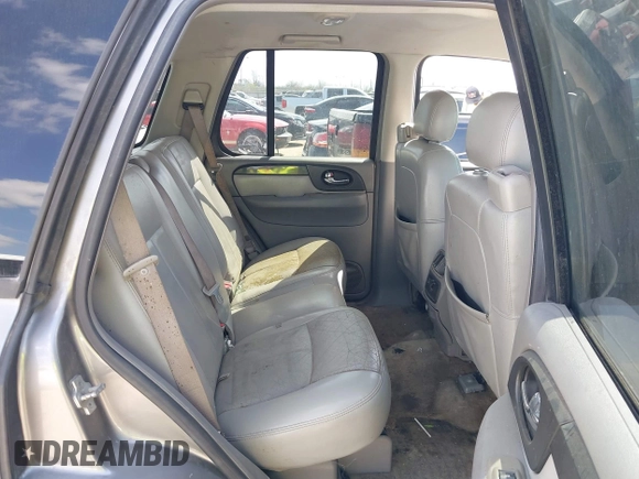2006 GMC Envoy SLT with VIN 1GKDS13S462185122, listed as a IAAI auction lot 41778816 with 220,974 mi miles. Bid and sale history available at carsss.com. Image 8.