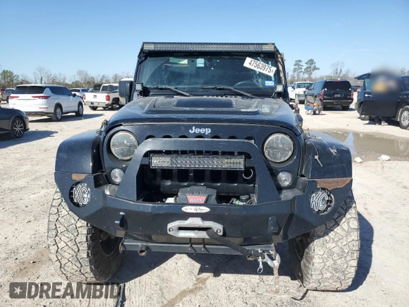 2015 Jeep Wrangler Unlimited Rubicon Hard Rock with VIN 1C4HJWFG1FL710264, listed as a Copart auction lot 47563975 with 96,737 mi miles and Salvage title. Bid and sale history available at DreamBid. Image 5.