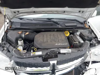 2017 Dodge Grand Caravan SXT with VIN 2C4RDGCG2HR645439, listed as a IAAI auction lot 42141378 with 161,518 mi miles and . Bid and sale history available at DreamBid. Image 10.