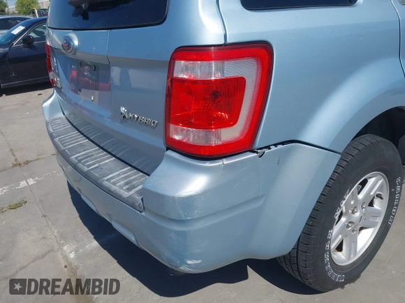 2009 Ford Escape Hybrid with VIN 1FMCU49319KB30484, listed as a IAAI auction lot 42160753 with 104,669 mi miles and . Bid and sale history available at DreamBid. Image 12.
