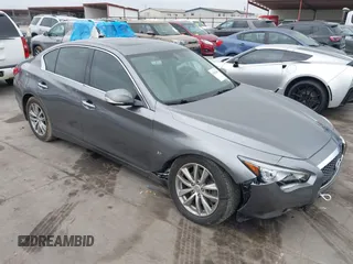 2015 Infiniti Q50 Premium z VIN JN1BV7AR7FM408015, wystawiony jako IAAI lot #42083301 z przebiegiem 58 817 mil mil oraz . Historia ofert i sprzedaży dostępna na DreamBid. Obrazek 1.