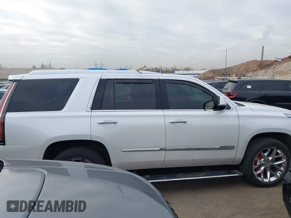 2017 Cadillac Escalade Platinum z VIN 1GYS4DKJ7HR277904, wystawiony jako IAAI lot #41757014 z przebiegiem 109 177 mil mil oraz . Historia ofert i sprzedaży dostępna na DreamBid. Obrazek 13.