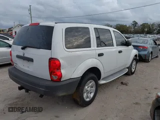2005 Dodge Durango SXT with VIN 1D4HD38N45F506298, listed as a IAAI auction lot 41198077 with 119,391 mi miles and . Bid and sale history available at DreamBid. Image 4.