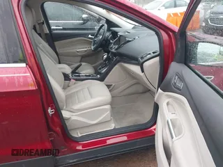 2014 Ford Escape Titanium with VIN 1FMCU0JX3EUD98815, listed as a IAAI auction lot 42078367 with 124,680 mi miles. Bid and sale history available at carsss.com. Image 5.