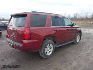 2020 Chevrolet Tahoe LT with VIN 1GNSKBKC1LR249131, listed as a IAAI auction lot 41084575 with 96,130 mi miles. Bid and sale history available at carsss.com. Image 4.