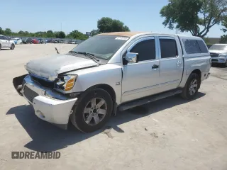 2004 Nissan Titan LE z VIN 1N6AA07A04N557030, wystawiony jako Copart lot #57178765 z przebiegiem Nie podano mil oraz Szkoda całkowita • Salvage title. Historia ofert i sprzedaży dostępna na DreamBid. Obrazek 1.