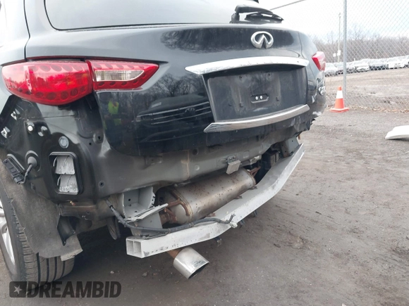 2016 Infiniti QX70 with VIN JN8CS1MWXGM752436, listed as a IAAI auction lot 41681170 with 130,208 mi miles and . Bid and sale history available at DreamBid. Image 6.