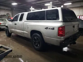 2006 Dodge Dakota SLT with VIN 1D7HW42NX6S711998, listed as a Copart auction lot 80129394 with 214,546 mi miles and Salvage Title. Bid and sale history available at carsss.com. Image 2.