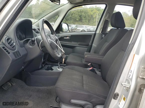 2010 Suzuki SX4 LE with VIN JS2YC5A21A6303767, listed as a Copart auction lot 72063074 with 114,140 mi miles and Clean Title. Bid and sale history available at carsss.com. Image 7.
