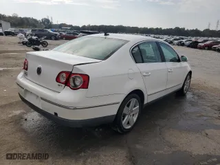 2009 Volkswagen Passat Sedan Komfort with VIN WVWJK73C59P025834, listed as a Copart auction lot 77911864 with 185,704 mi miles and Salvage Title. Bid and sale history available at carsss.com. Image 3.