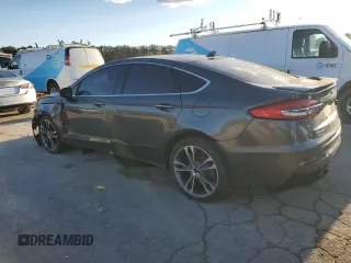 2019 Ford Fusion Titanium with VIN 3FA6P0K98KR271219, listed as a Copart auction lot 47873695 with 121,751 mi miles and Clean Title. Bid and sale history available at carsss.com. Image 2.