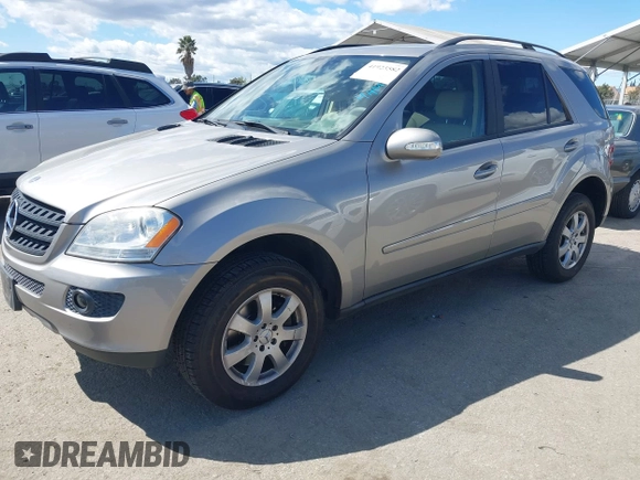 2006 Mercedes-Benz M 350 with VIN 4JGBB86E06A018999, listed as a IAAI auction lot 41923582 with 77,121 mi miles and . Bid and sale history available at DreamBid. Image 2.
