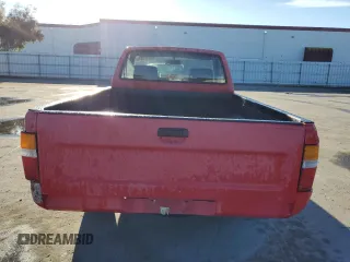 1991 Toyota Pickup z VIN JT4RN81AXM0072912, wystawiony jako Copart lot #86072004 z przebiegiem 210 493 mil mil oraz Szkoda całkowita • Salvage title. Historia ofert i sprzedaży dostępna na DreamBid. Obrazek 6.