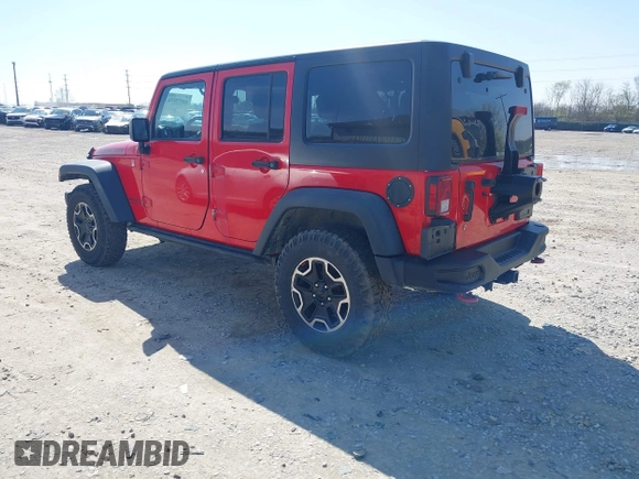 2015 Jeep Wrangler Unlimited Rubicon Hard Rock with VIN 1C4HJWFG9FL525556, listed as a IAAI auction lot 41973576 with 246,949 mi miles and . Bid and sale history available at DreamBid. Image 3.