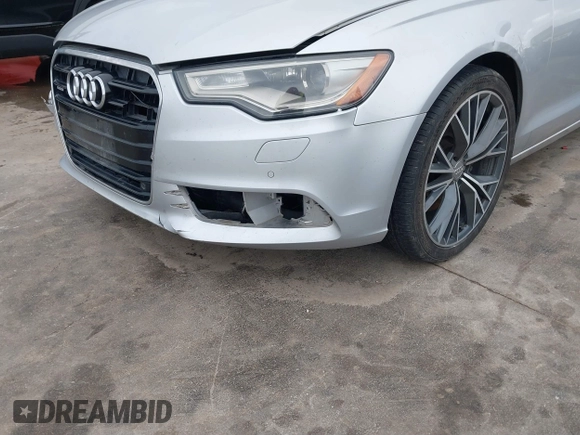 2015 Audi A6 Premium Plus z VIN WAUGFAFC8FN032627, wystawiony jako IAAI lot #41270302 z przebiegiem 82 104 mil mil oraz . Historia ofert i sprzedaży dostępna na DreamBid. Obrazek 18.
