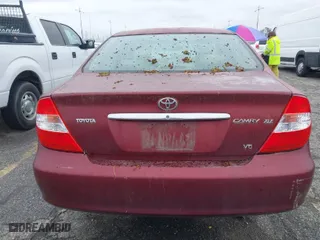 2004 Toyota Camry LE with VIN 4T1BF32K54U069705, listed as a IAAI auction lot 41809582 with 194,606 mi miles. Bid and sale history available at carsss.com. Image 13.