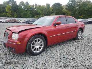 2009 Chrysler 300 Touring with VIN 2C3KA53V99H617274, listed as a Copart auction lot 71791144 with 123,045 mi miles and Salvage Title. Bid and sale history available at carsss.com. Image 1.