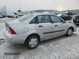 2001 Ford Focus LX with VIN 1FAFP33P11W359944, listed as a Copart auction lot 84024874 with 111,521 mi miles and Non Repairable. Bid and sale history available at carsss.com. Image 3.