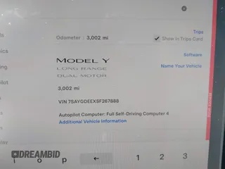2025 Tesla Model Y Long Range with VIN 7SAYGDEEXSF267888, listed as a IAAI auction lot 41807129 with 3,002 mi miles and . Bid and sale history available at DreamBid. Image 7.