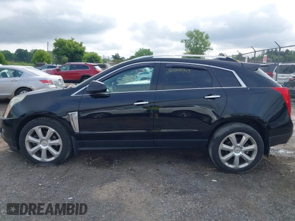 2015 Cadillac SRX Performance Collection with VIN 3GYFNFE35FS591343, listed as a IAAI auction lot 42644949 with 118,718 mi miles and . Bid and sale history available at DreamBid. Image 15.