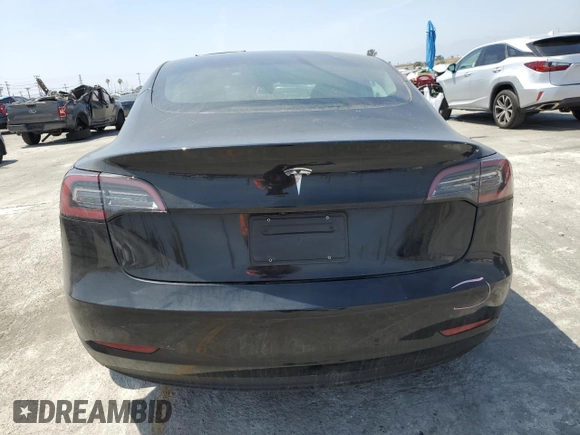 2023 Tesla Model 3 z VIN 5YJ3E1EA7PF549051, wystawiony jako Copart lot #58932765 z przebiegiem 8 800 mil mil oraz Szkoda całkowita • Salvage title. Historia ofert i sprzedaży dostępna na DreamBid. Obrazek 6.