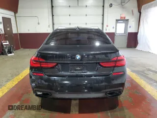 2019 BMW 7 Series 740i xDrive with VIN WBA7E4C50KGV28708, listed as a Copart auction lot 55141895 with 130,925 mi miles and Clean title. Bid and sale history available at DreamBid. Image 6.