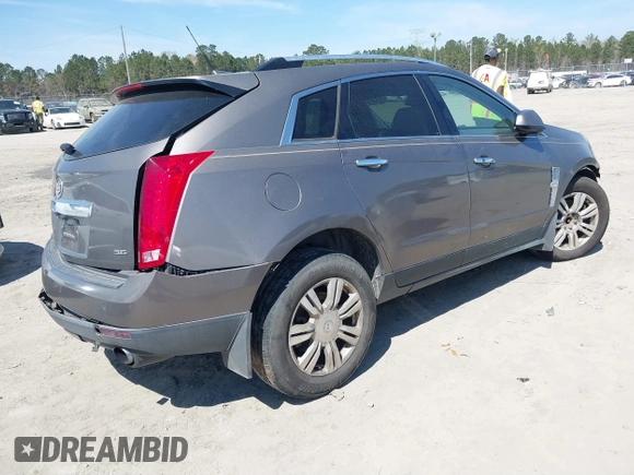 2012 Cadillac SRX Luxury Collection with VIN 3GYFNAE36CS509456, listed as a IAAI auction lot 41833647 with 119,931 mi miles and . Bid and sale history available at carsss.com. Image 4.