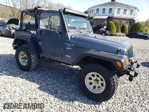 2002 Jeep Wrangler Sport with VIN 1J4FA49S92P715480, listed as a Copart auction lot 55157545 with 153,560 mi miles and Clean Title. Bid and sale history available at carsss.com. Image 4.