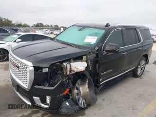 2021 GMC Yukon Denali with VIN 1GKS2DKL3MR308321, listed as a IAAI auction lot 41771365 with 63,415 mi miles. Bid and sale history available at carsss.com. Image 2.