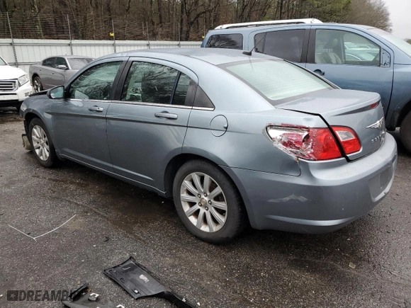 2010 Chrysler Sebring Limited with VIN 1C3CC5FB4AN199931, listed as a Copart auction lot 42709965 with 203,063 mi miles and Salvage Title. Bid and sale history available at carsss.com. Image 2.