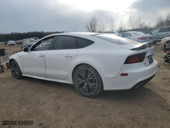 2016 Audi A7 3.0 Prestige with VIN WAU2GAFC9GN052829, listed as a Copart auction lot 39711603 with 103,284 mi miles. Bid and sale history available at carsss.com. Image 2.